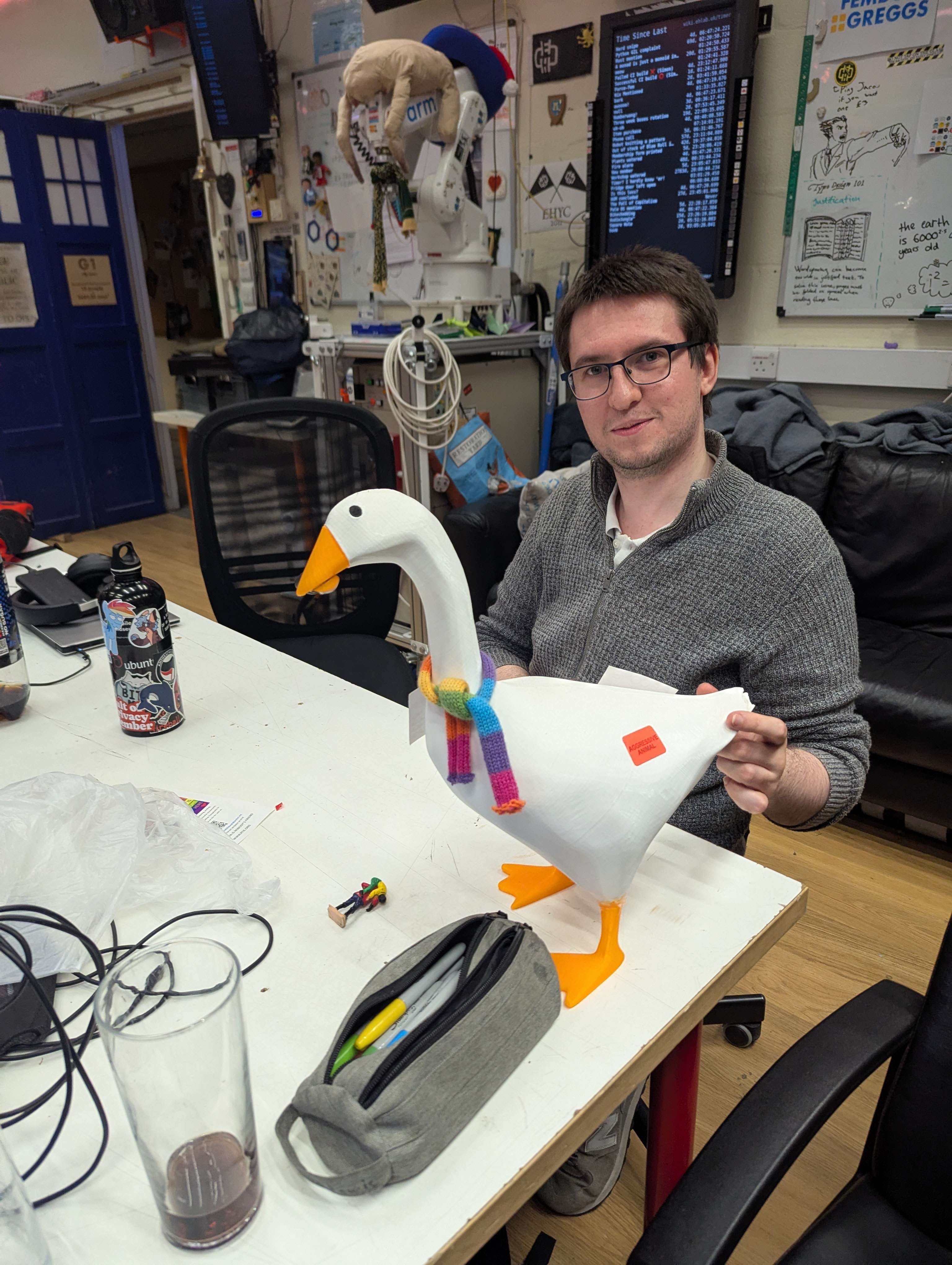 A 3D printed model of a goose, on top of a table.